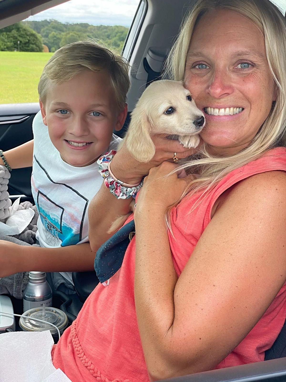 Susan Williams holding her RoyalDachshund Dachshund puppy